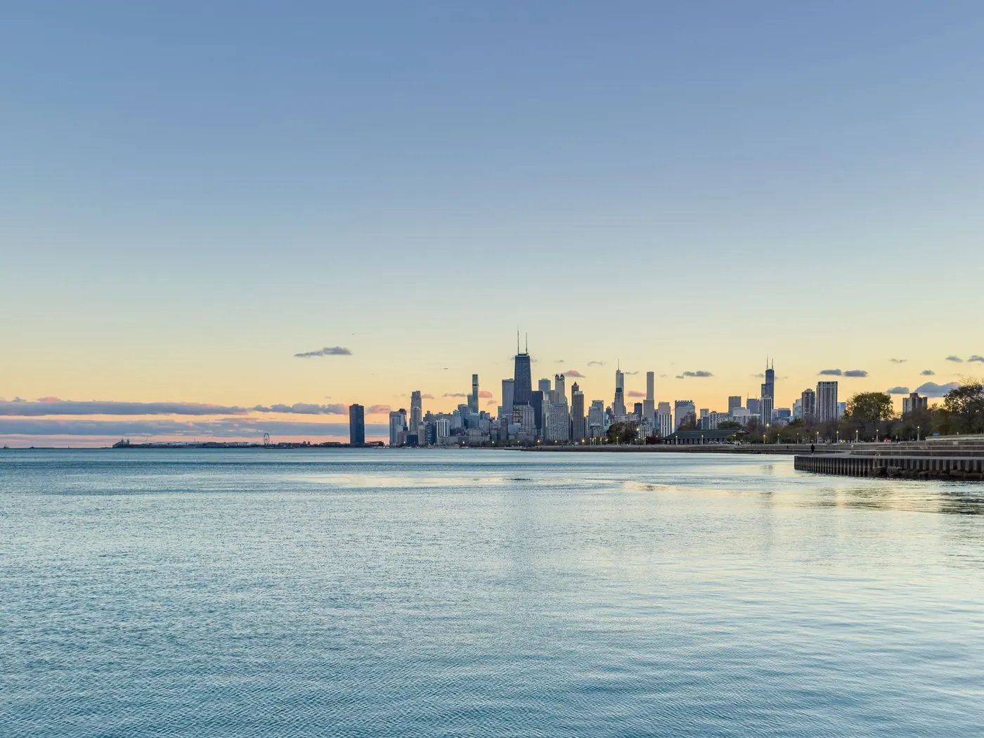 Chicago skyline across Lake Michigan at sunrise